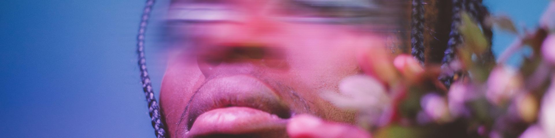 close crop of a blurred face showing movement